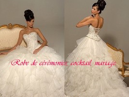 Robe de mariée prestige blanc cassé en tulle bustier perlé VENDU avec jupon adapté.