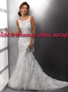 Robe de mariée SMP coupe trompette ornée de dentelle.