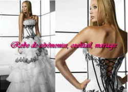 Robe de mariée blanc et noir avec laçage.