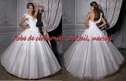 Robe de princesse NVP blanche coupe asymétrique VENDU avec jupon adapté.
