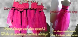 Robe de cocktail coupe asymétrique fuchsia et noir
