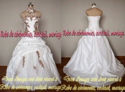 Robe de mariée Ivoire et Chocolat avec col américain remplit VENDU avec jupon adapté.