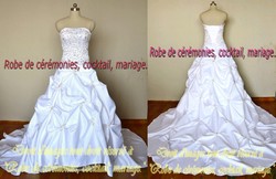 Robe de mariée blanche bustier ornée de strass VENDU avec jupon adapté.