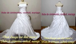 Robe de mariée ivoire motif floral VENDU avec jupon adapté.