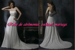 Robe de mariée SMP blanche coupe empire ceinturé ivoire.