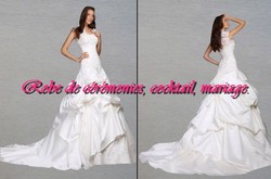 Robe de mariée romantique blanche sans manche vendu avec jupon et boléro.