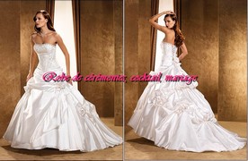Robe de mariée prestige blanche bustier ornée de strass VENDU avec jupon adapté.